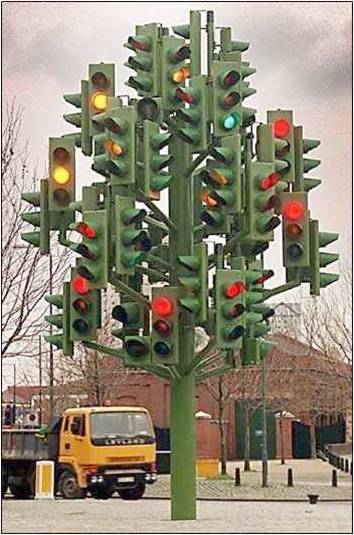 A traffic signal with dozens of lights pointing in all directions.
