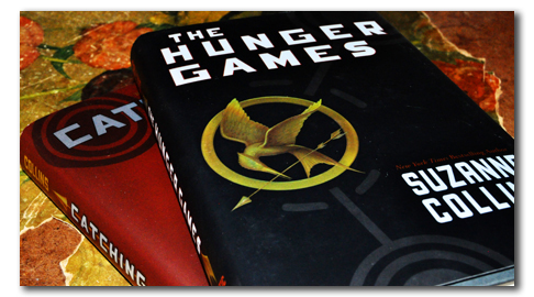 Two of the books in Suzanne Collins’ Hunger Games trilogy are shown here.