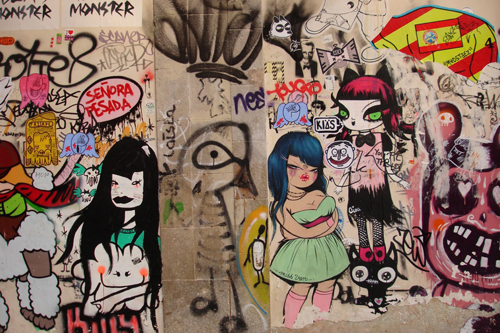 A wall of graffiti is shown.